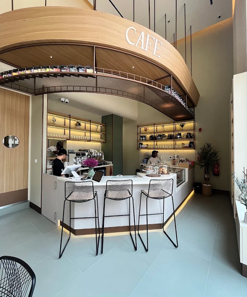 Sleek cafe interior and order counter at Pawdy Neighbors.