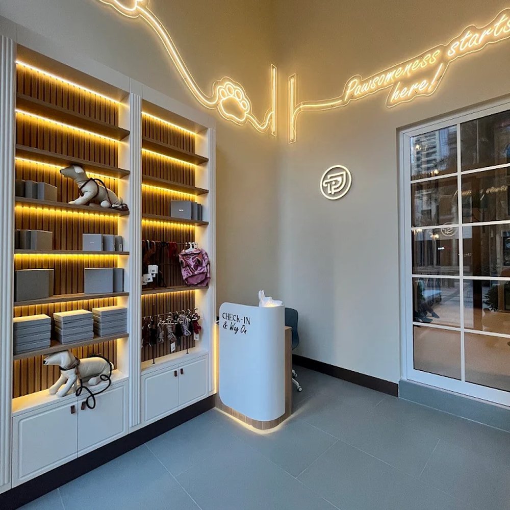 Pawdy Neighbors Boulevard, Dubai, showing pet-friendly cafe decor and retail shelves